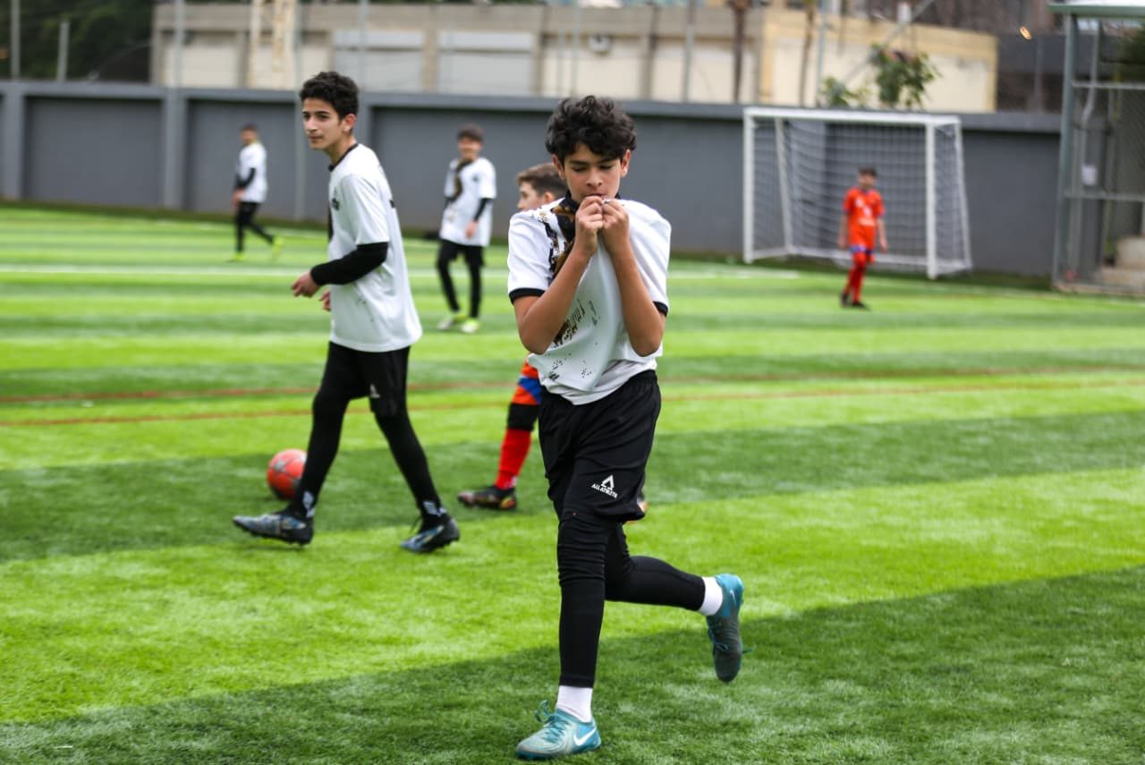 Player chasing down the ball