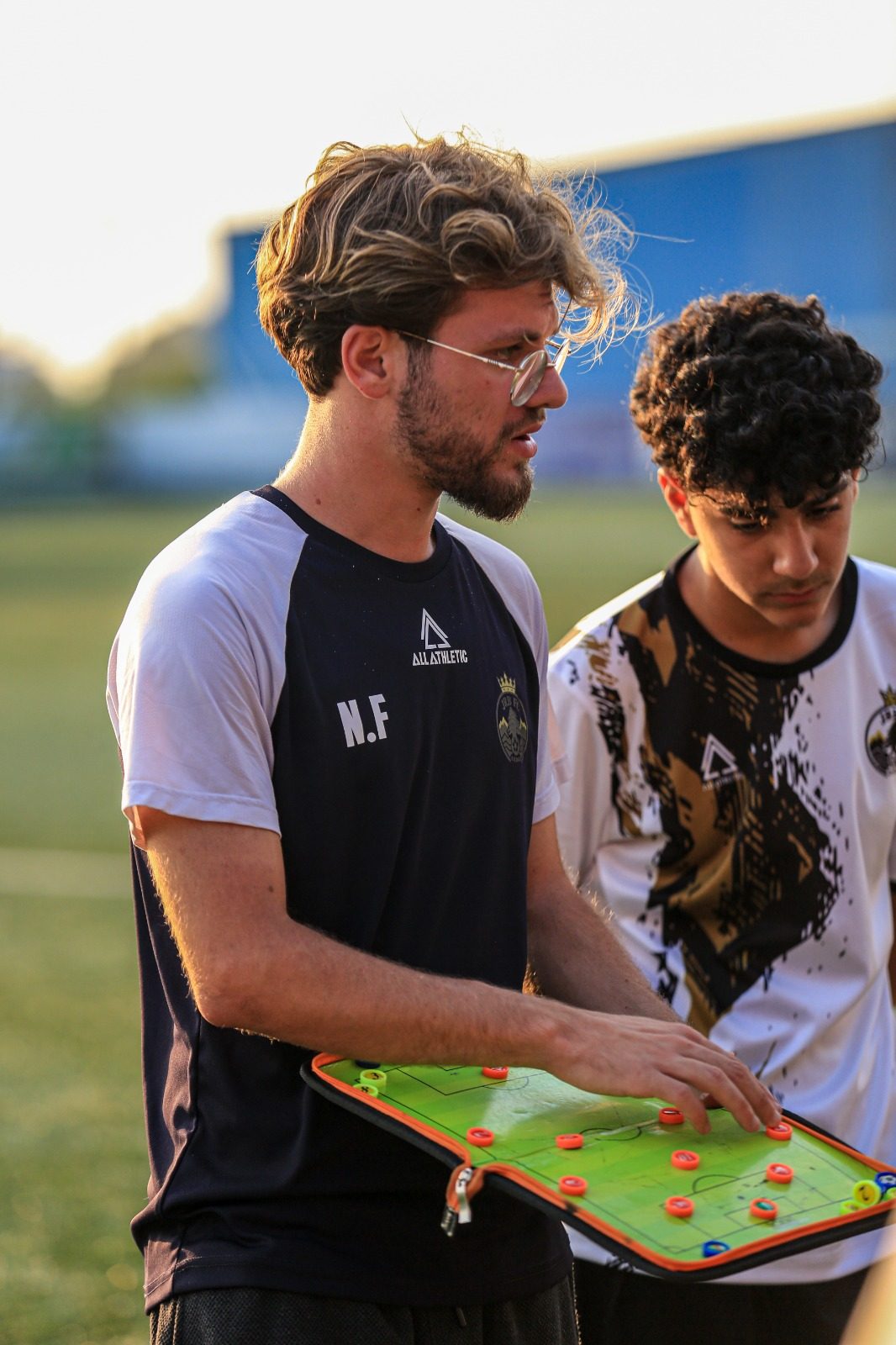 Coach with a JRB FA player