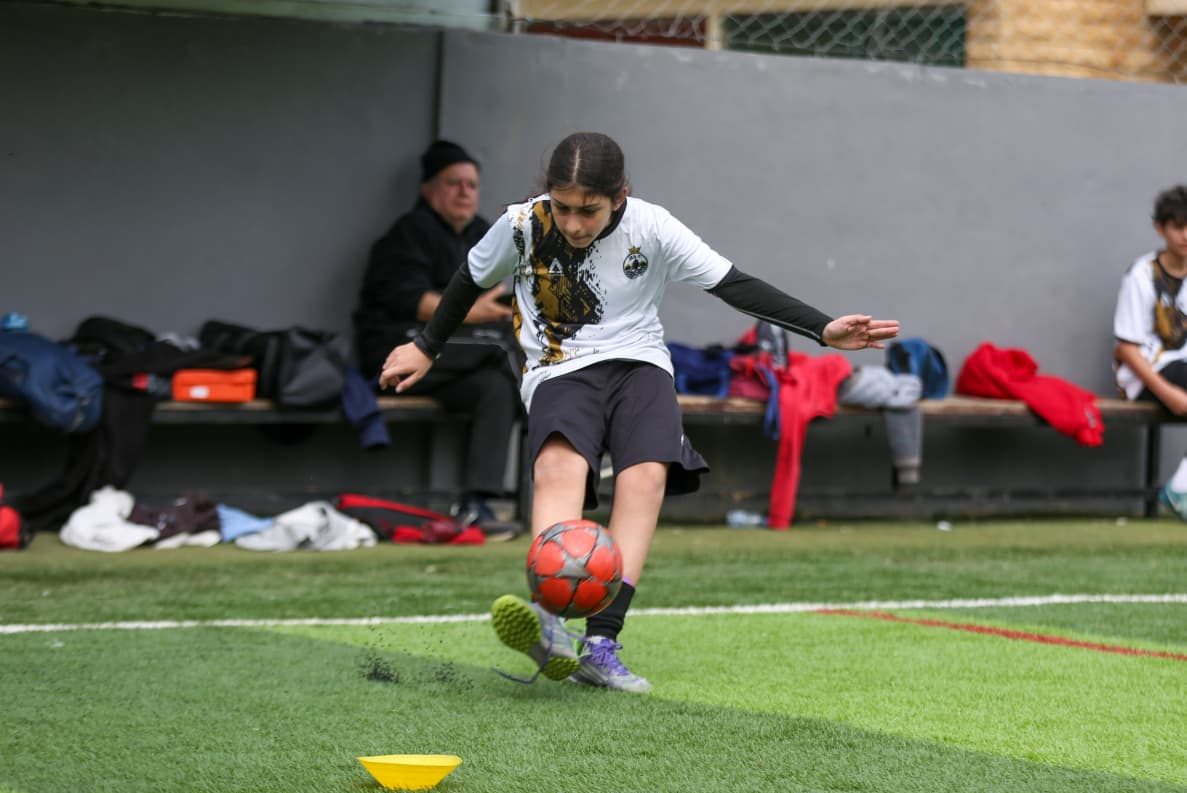 Coach running a cone drill