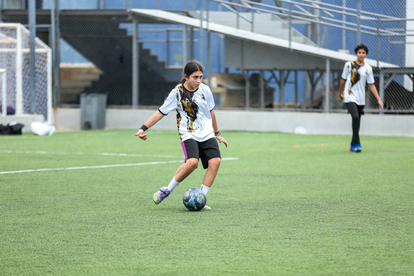Player dribbling in open space