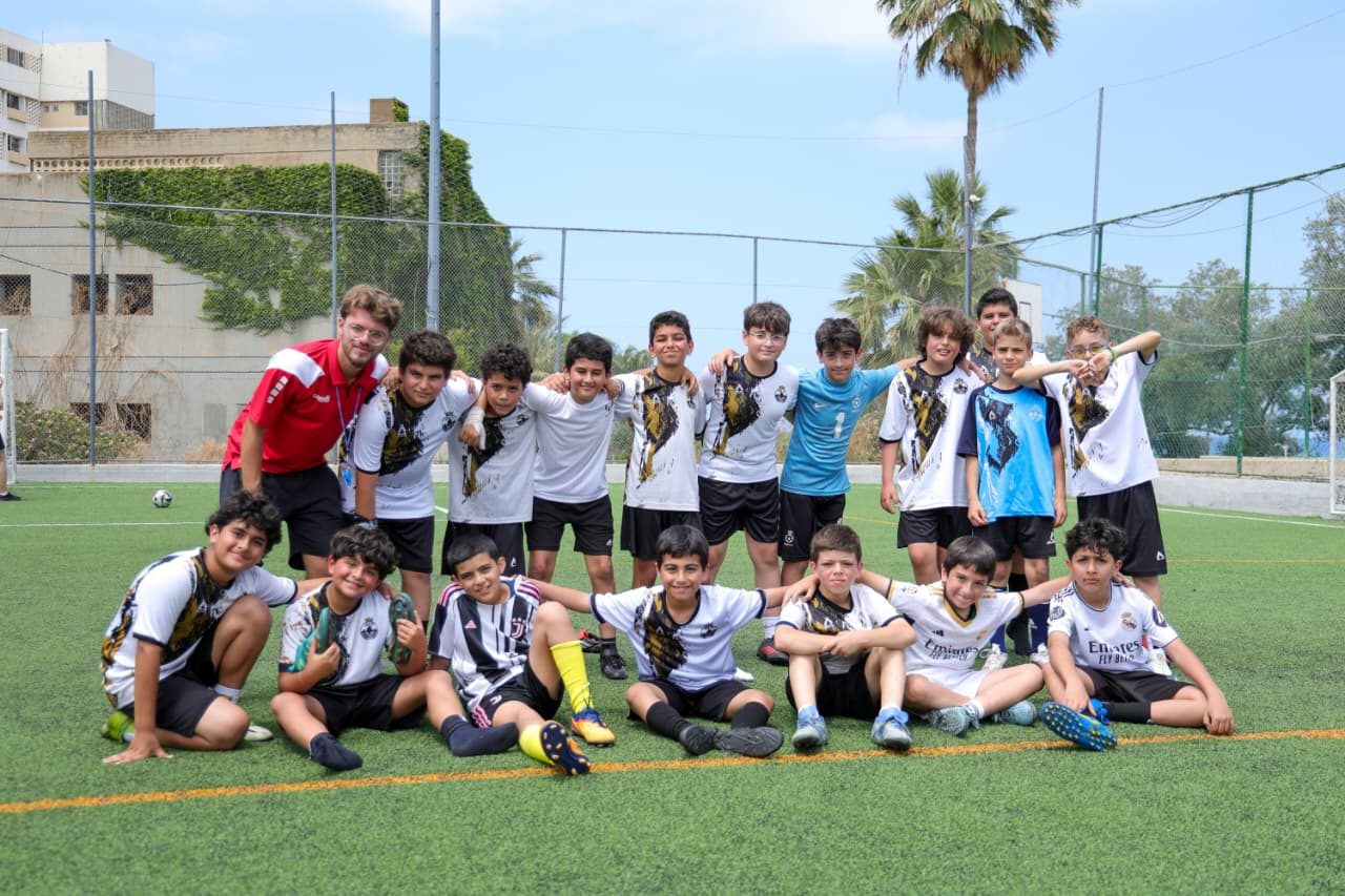 Team celebrating together on the pitch
