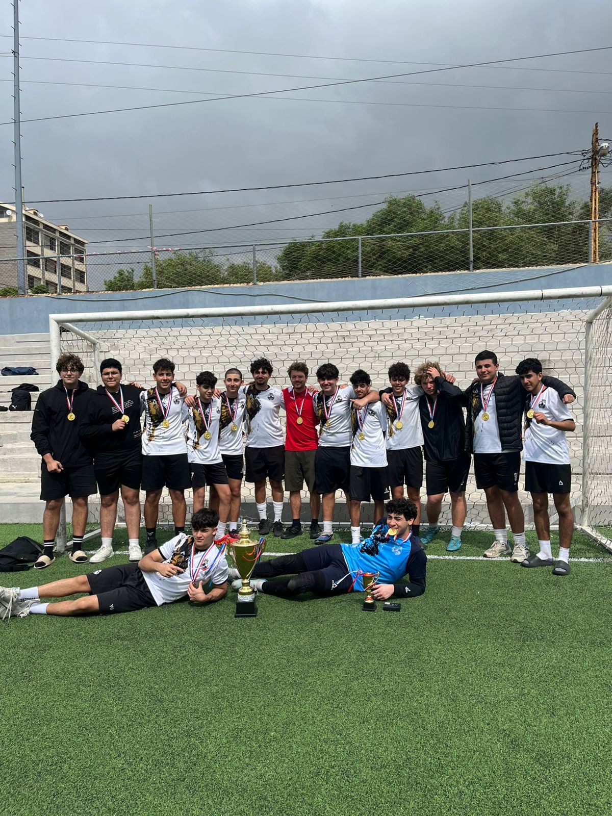 Team resting on the pitch