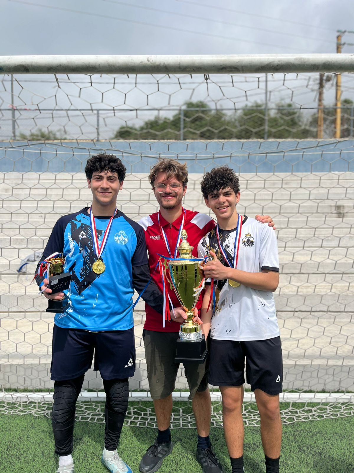 Three players with medals